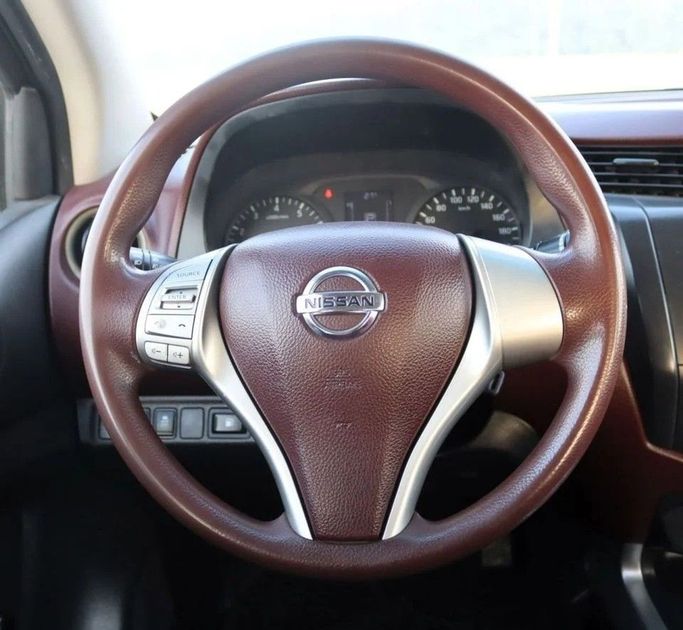 Подержанный Nissan Navara (Frontier) IV (D23), 2.5 л, 2022 в Шардже от Al Sayed Khamis Used Cars Белый цвет. GCC | AUTO.AE
