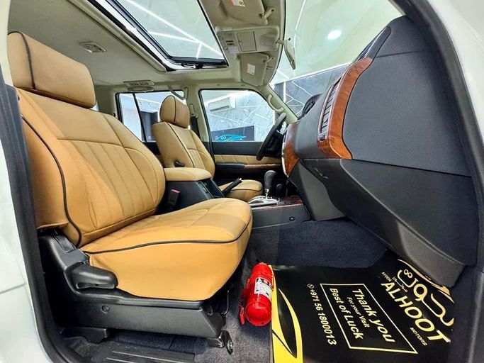 Used Nissan Patrol V (Y61) Facelift, 4.8 l, 2023 in Sharjah by Ayoon Alhoot Motors, White color. GCC Specs | AUTO.AE