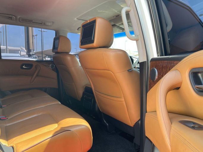 Подержанный Nissan Patrol VI (Y62) Рестайлинг, 5.6 л, 2014 в Шардже от Al Aram Cars Белый цвет. GCC | AUTO.AE