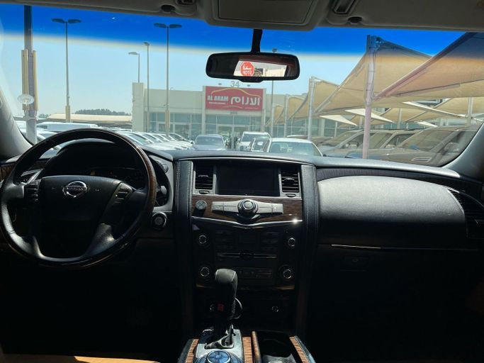 Подержанный Nissan Patrol VI (Y62) Рестайлинг, 5.6 л, 2014 в Шардже от Al Aram Cars Белый цвет. GCC | AUTO.AE