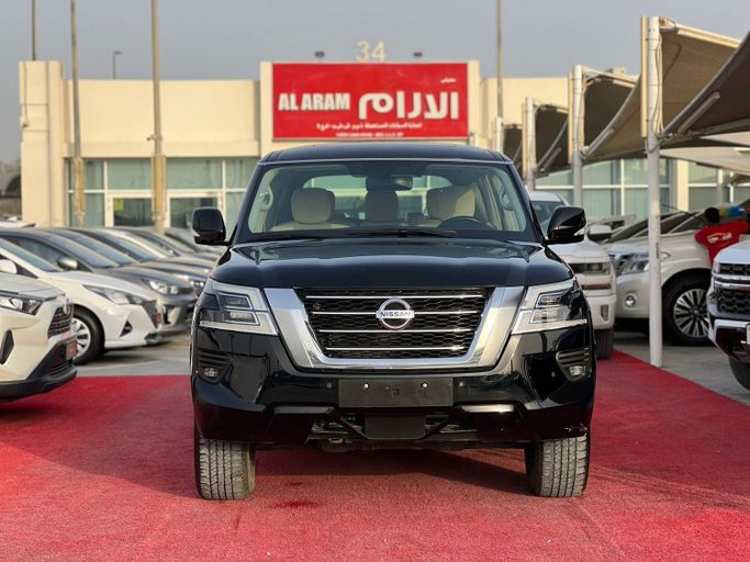 Подержанный Nissan Patrol VI (Y62) Рестайлинг 2, 4.0 л, 2021 в Шардже от Al Aram Cars Черный цвет. GCC | AUTO.AE