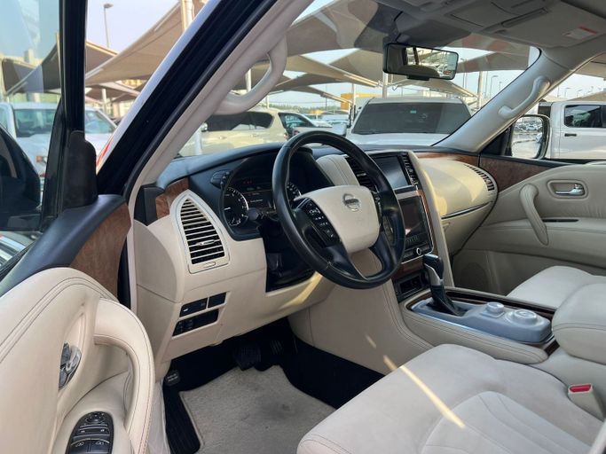 Подержанный Nissan Patrol VI (Y62) Рестайлинг 2, 4.0 л, 2021 в Шардже от Al Aram Cars Черный цвет. GCC | AUTO.AE