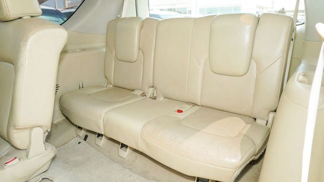 Подержанный Nissan Patrol VI (Y62), 5.6 л, 2014 в Шардже от Alnujoom Al Malakiah Used Cars Белый цвет. GCC | AUTO.AE