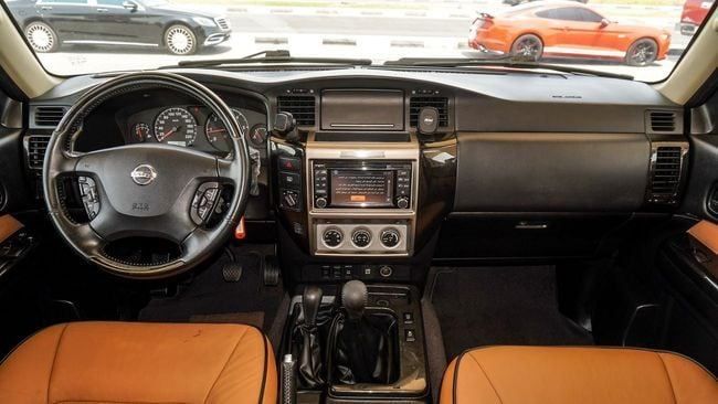 Подержанный Nissan Patrol V (Y61) Рестайлинг, 4.8 л, 2019 в Шардже от Abo Saif Золотистый цвет. GCC | AUTO.AE