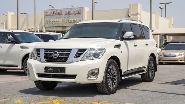 Used Nissan Patrol VI (Y62), 5.6 l, 2014 in Sharjah by Alnujoom Al Malakiah Used Cars, White color. GCC Specs | AUTO.AE