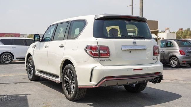 Used Nissan Patrol VI (Y62) Facelift, 5.6 l, 2018 in Sharjah by Alnujoom Al Malakiah Used Cars, White color. GCC Specs | AUTO.AE