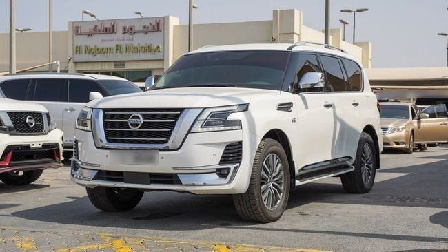 Used Nissan Patrol VI (Y62) Facelift 2, 5.6 l, 2020 in Sharjah by Alnujoom Al Malakiah Used Cars, White color. GCC Specs | AUTO.AE