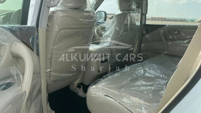 Новый Nissan Patrol VI (Y62) Рестайлинг 2, 5.6 л, 2023 в Шардже от Nour Alnukhba Motors Белый цвет. Other | AUTO.AE