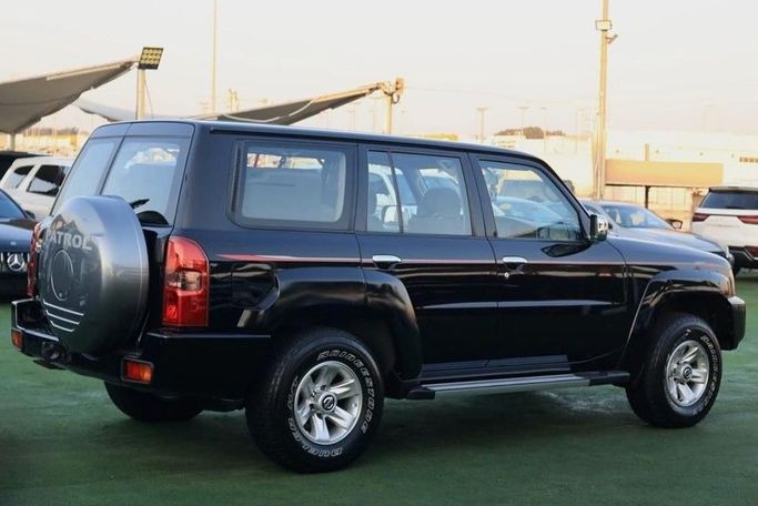 Подержанный Nissan Patrol V (Y61) Рестайлинг, 4.8 л, 2021 в Шардже от Al Bake Used Cars Черный цвет.  | AUTO.AE