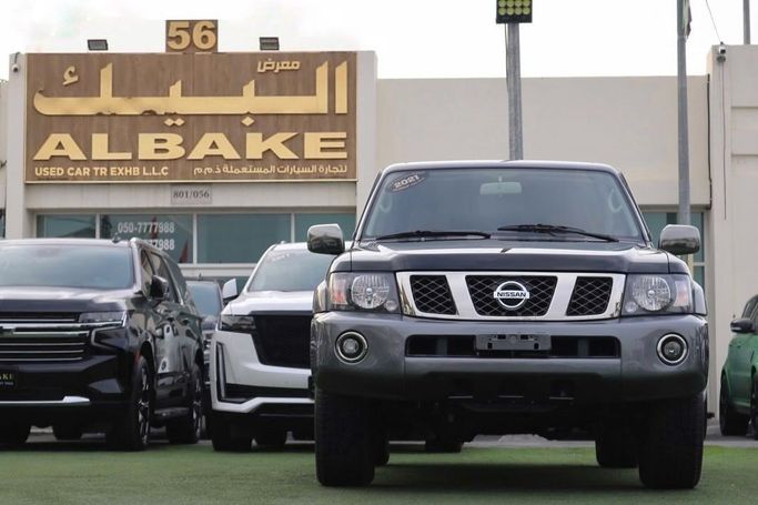 Подержанный Nissan Patrol V (Y61) Рестайлинг, 4.8 л, 2021 в Шардже от Al Bake Used Cars Серый цвет.  | AUTO.AE
