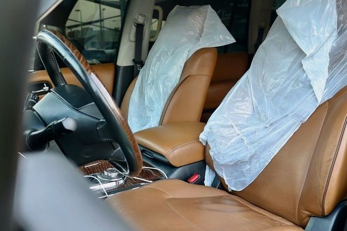 Подержанный Nissan Patrol VI (Y62) Рестайлинг, 5.6 л, 2016 в Шардже от Al Bake Used Cars Черный цвет. GCC | AUTO.AE