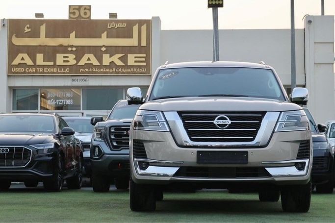 Used Nissan Patrol VI (Y62) Facelift 2, 5.6 l, 2021 in Sharjah by Al Bake Used Cars, Golden color. GCC Specs | AUTO.AE