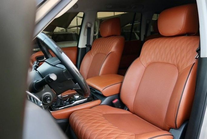 Used Nissan Patrol VI (Y62) Facelift 2, 5.6 l, 2021 in Sharjah by Al Bake Used Cars, Golden color. GCC Specs | AUTO.AE