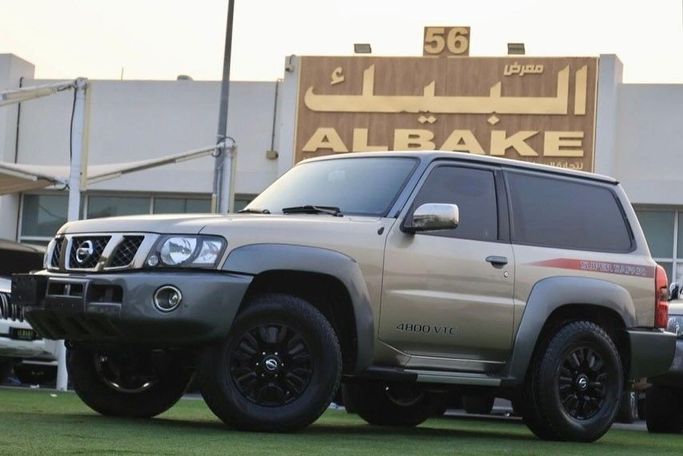 Подержанный Nissan Patrol V (Y61) Рестайлинг, 4.8 л, 2016 в Шардже от Al Bake Used Cars Золотистый цвет. GCC | AUTO.AE