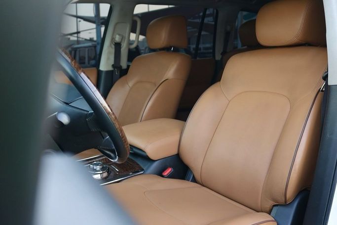 Подержанный Nissan Patrol VI (Y62) Рестайлинг, 4.0 л, 2017 в Шардже от Al Bake Used Cars Белый цвет. GCC | AUTO.AE