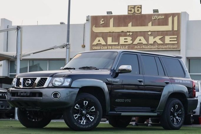 Used Nissan Patrol V (Y61) Facelift, 4.8 l, 2024 in Sharjah by Al Bake Used Cars, Black color.  | AUTO.AE