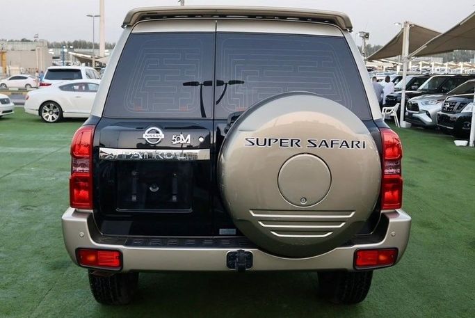 Подержанный Nissan Patrol V (Y61) Рестайлинг, 4.8 л, 2021 в Шардже от Al Bake Used Cars Черный цвет. GCC | AUTO.AE