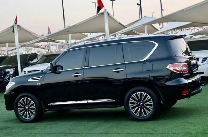 Подержанный Nissan Patrol VI (Y62) Рестайлинг, 5.6 л, 2016 в Шардже от Al Bake Used Cars Черный цвет.  | AUTO.AE