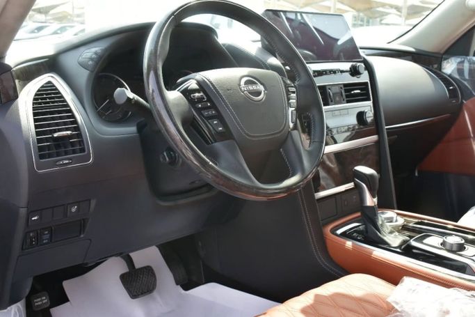 Новый Nissan Patrol VI (Y62) Рестайлинг 2, 5.6 л, 2024 в Шардже от Alfaris Used Cars Черный цвет. GCC | AUTO.AE