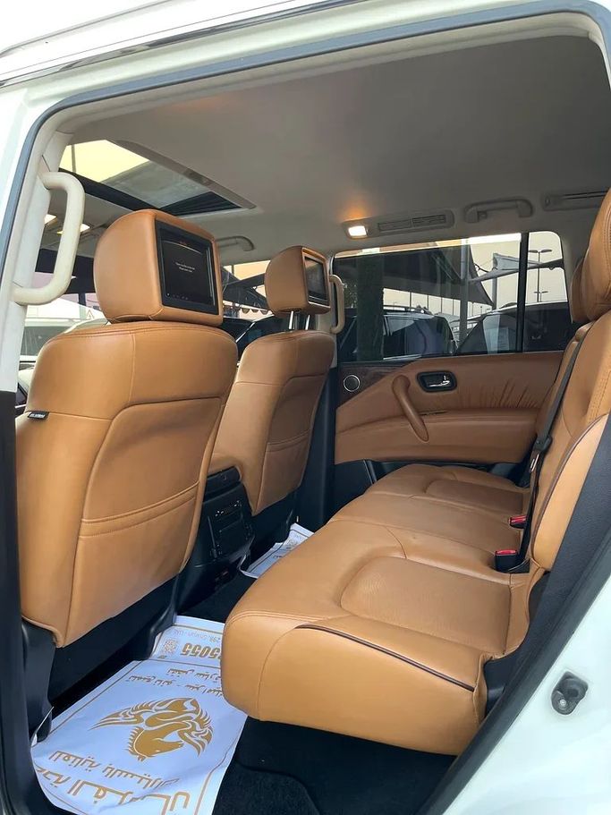 Used Nissan Patrol VI (Y62) Facelift 2, 5.6 l, 2019 in Sharjah by Al Muhtaref Used Cars, White color. GCC Specs | AUTO.AE