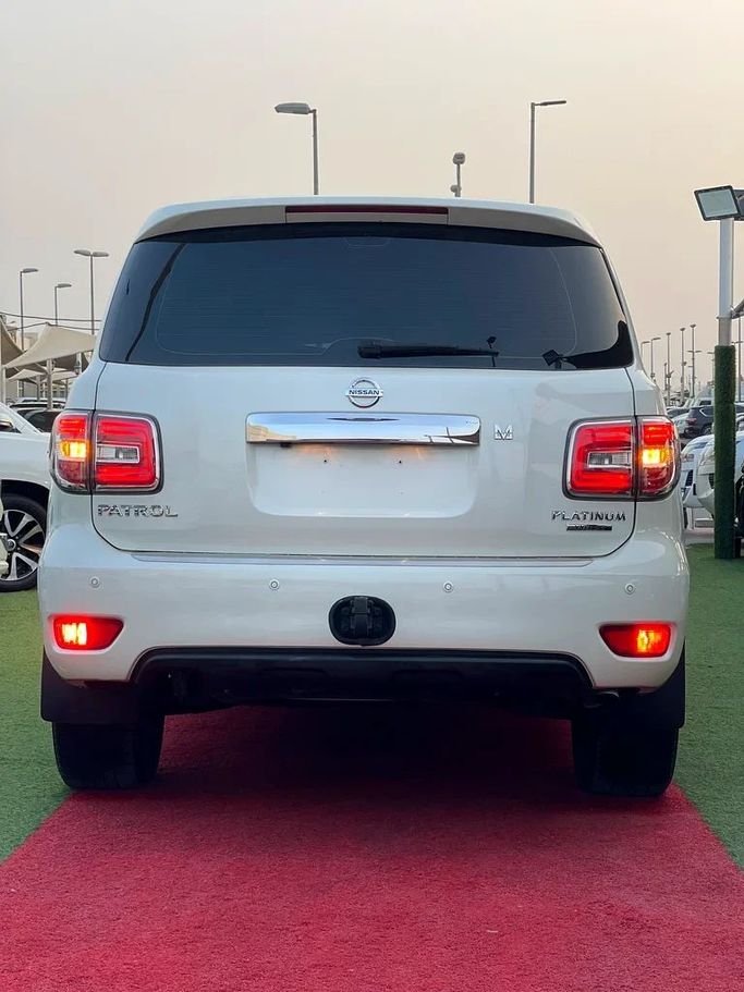 Used Nissan Patrol VI (Y62) Facelift 2, 5.6 l, 2019 in Sharjah by Al Muhtaref Used Cars, White color. GCC Specs | AUTO.AE
