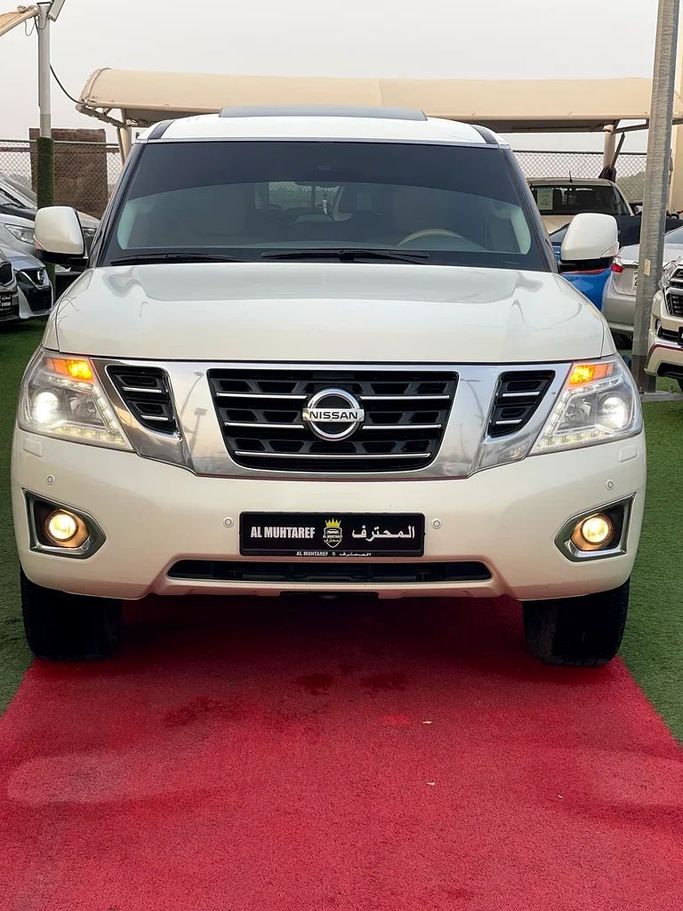 Used Nissan Patrol VI (Y62) Facelift, 4.0 l, 2014 in Sharjah by Al Muhtaref Used Cars, White color. GCC Specs | AUTO.AE