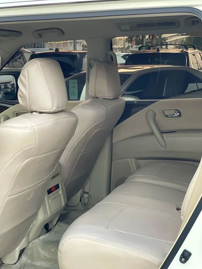 Used Nissan Patrol VI (Y62) Facelift, 4.0 l, 2014 in Sharjah by Al Muhtaref Used Cars, White color. GCC Specs | AUTO.AE