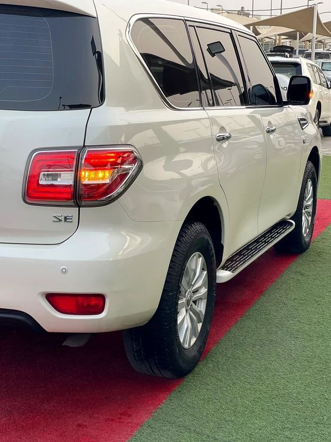 Used Nissan Patrol VI (Y62) Facelift, 4.0 l, 2014 in Sharjah by Al Muhtaref Used Cars, White color. GCC Specs | AUTO.AE