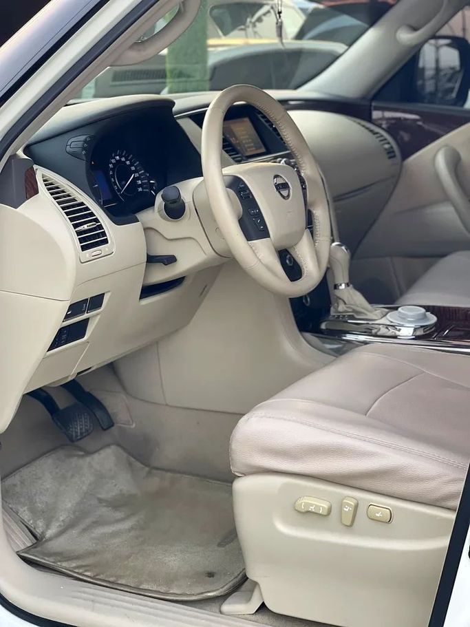 Used Nissan Patrol VI (Y62) Facelift, 4.0 l, 2014 in Sharjah by Al Muhtaref Used Cars, White color. GCC Specs | AUTO.AE