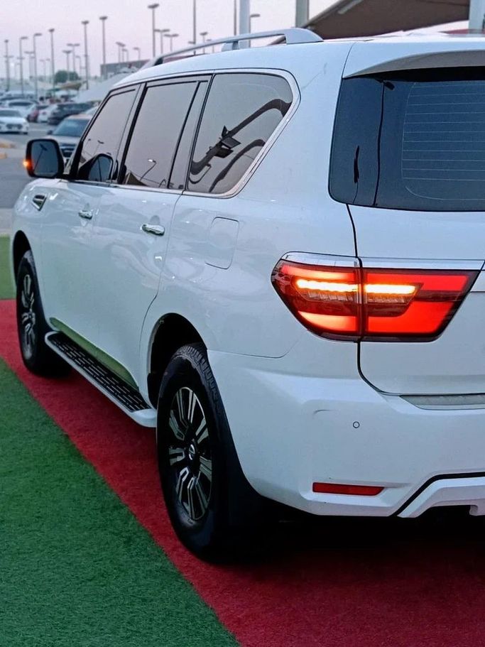 Used Nissan Patrol VI (Y62) Facelift 2, 5.6 l, 2020 in Sharjah by Al Muhtaref Used Cars, White color. GCC Specs | AUTO.AE