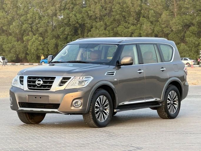 Подержанный Nissan Patrol VI (Y62) Рестайлинг 2, 5.6 л, 2019 в Шардже от Al Aayan Used Cars Коричневый цвет. GCC | AUTO.AE