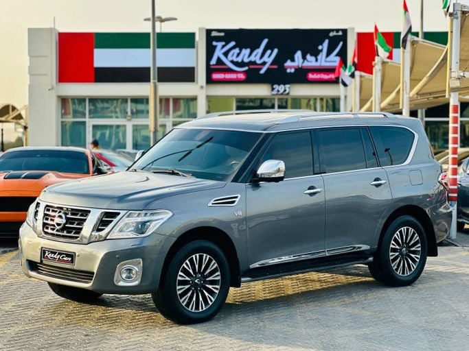 Подержанный Nissan Patrol VI (Y62), 5.6 л, 2014 в Шардже от Kandy Cars Серый цвет. Американская | AUTO.AE
