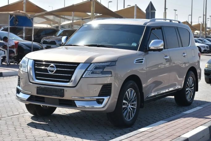 Подержанный Nissan Patrol VI (Y62) Рестайлинг 2, 5.6 л, 2021 в Шардже от Alfaris Used Cars Бежевый цвет. Other | AUTO.AE