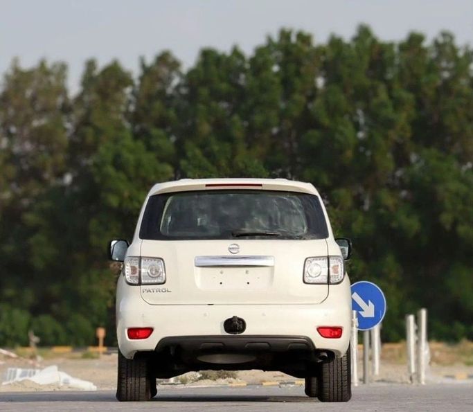 Подержанный Nissan Patrol VI (Y62) Рестайлинг, 5.6 л, 2019 в Шардже от Al Sayed Khamis Used Auto Trading Белый цвет. GCC | AUTO.AE