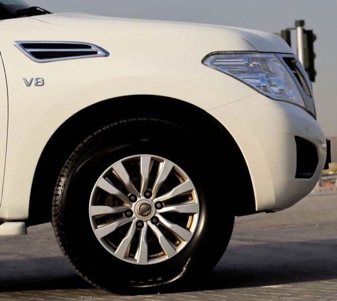 Подержанный Nissan Patrol VI (Y62) Рестайлинг, 5.6 л, 2019 в Шардже от Al Sayed Khamis Used Auto Trading Белый цвет. GCC | AUTO.AE