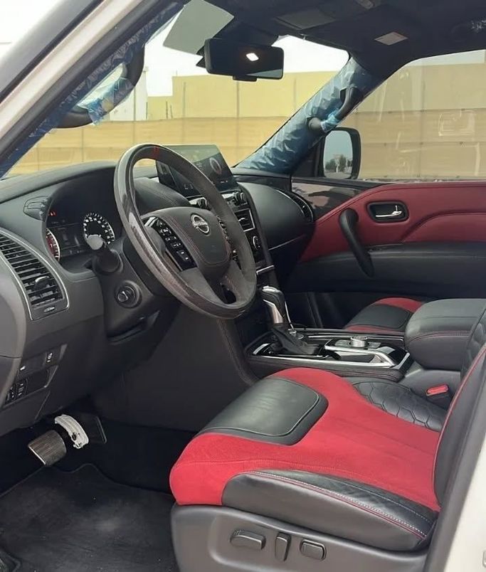 Подержанный Nissan Patrol VI (Y62) Рестайлинг 2, 5.6 л, 2022 в Шардже от Alfaris Used Cars Белый цвет. GCC | AUTO.AE