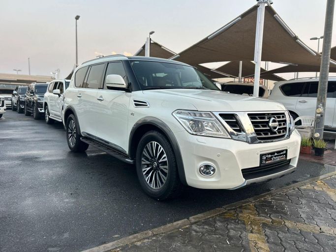 Used Nissan Patrol VI (Y62) Facelift, 4.0 l, 2019 in Sharjah by Al Ostoura Used Cars, White color. Other | AUTO.AE