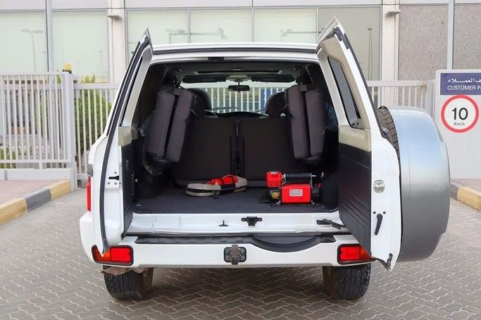 Подержанный Nissan Patrol V (Y61) Рестайлинг, 4.8 л, 2021 в Шардже от Al Rukin Al Saudi Белый цвет. GCC | AUTO.AE