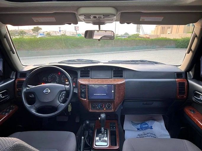 Used Nissan Patrol V (Y61) Facelift, 4.8 l, 2021 in Sharjah by Al Rukin Al Saudi, White color. GCC Specs | AUTO.AE