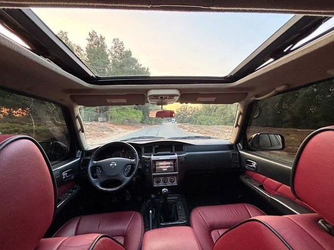 Used Nissan Patrol V (Y61) Facelift, 4.8 l, 2023 in Sharjah by Almasar Used Cars, Black color. GCC Specs | AUTO.AE