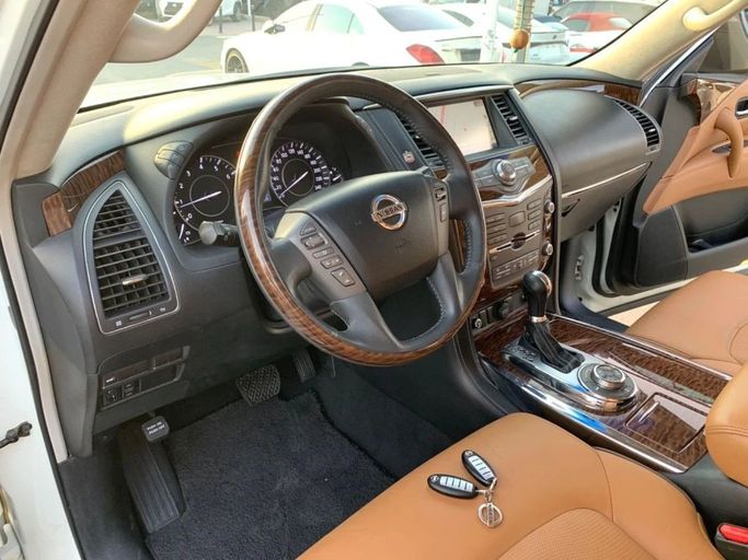 Used Nissan Patrol VI (Y62) Facelift, 5.6 l, 2016 in Sharjah by Titanium Used Cars, White color. GCC Specs | AUTO.AE
