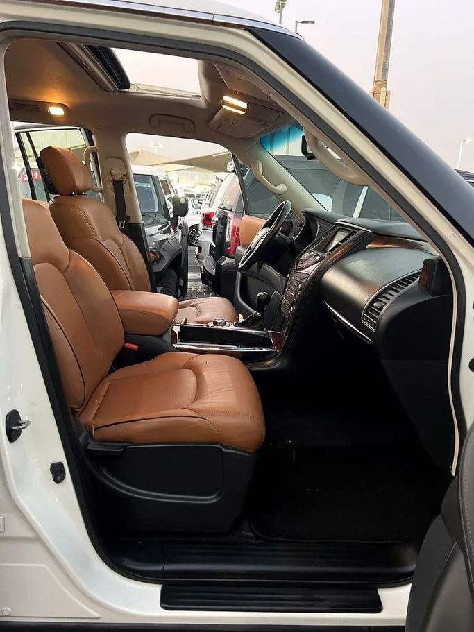 Подержанный Nissan Patrol VI (Y62) Рестайлинг, 4.0 л, 2016 в Шардже от Taj Al Impratoor Used Cars Белый цвет. GCC | AUTO.AE