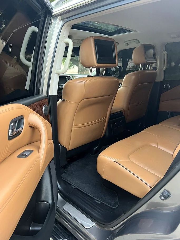 Подержанный Nissan Patrol VI (Y62) Рестайлинг, 5.6 л, 2015 в Шардже от Taj Al Impratoor Used Cars Серый цвет. GCC | AUTO.AE