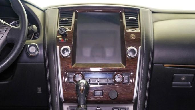 Подержанный Nissan Patrol VI (Y62) Рестайлинг, 4.0 л, 2019 в Шардже от Alsalama Motors Белый цвет. GCC | AUTO.AE