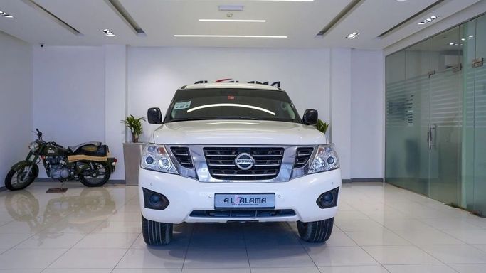 Подержанный Nissan Patrol VI (Y62) Рестайлинг, 4.0 л, 2019 в Шардже от Alsalama Motors Белый цвет. GCC | AUTO.AE
