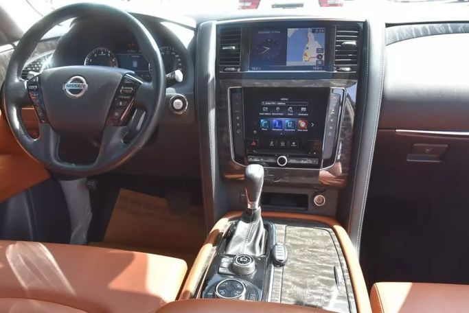 Подержанный Nissan Patrol VI (Y62) Рестайлинг 2, 5.6 л, 2021 в Шардже от Alfaris Used Cars Черный цвет. GCC | AUTO.AE