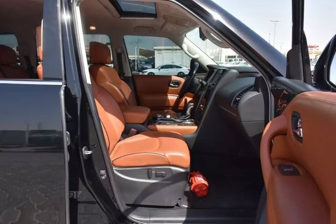 Подержанный Nissan Patrol VI (Y62) Рестайлинг 2, 5.6 л, 2021 в Шардже от Alfaris Used Cars Черный цвет. GCC | AUTO.AE