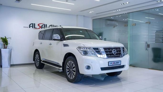 Подержанный Nissan Patrol VI (Y62) Рестайлинг, 4.0 л, 2018 в Шардже от Alsalama Motors Белый цвет. GCC | AUTO.AE