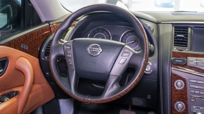 Подержанный Nissan Patrol VI (Y62) Рестайлинг, 4.0 л, 2018 в Шардже от Alsalama Motors Белый цвет. GCC | AUTO.AE