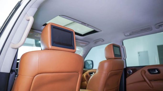 Подержанный Nissan Patrol VI (Y62) Рестайлинг, 4.0 л, 2018 в Шардже от Alsalama Motors Белый цвет. GCC | AUTO.AE